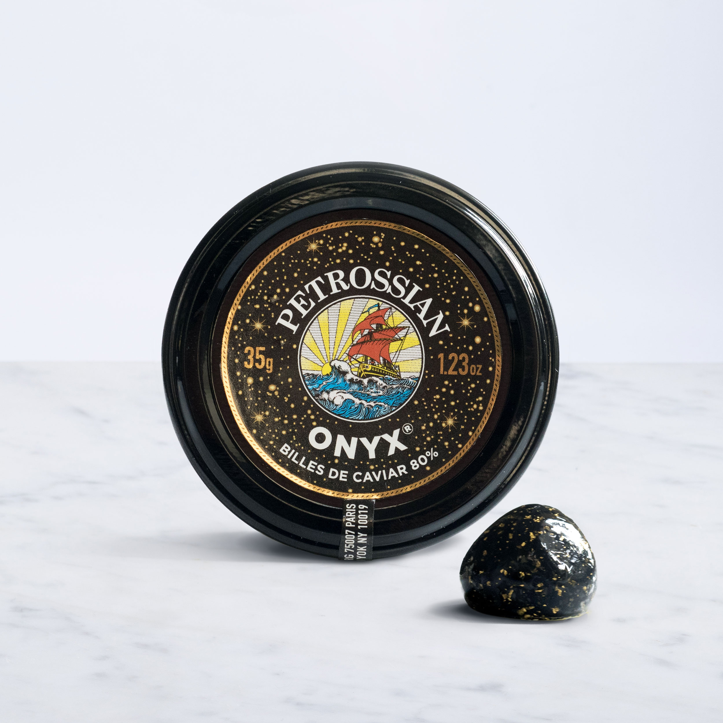 Conception graphique d’un packaging de billes de caviar pour la marque Petrossian.